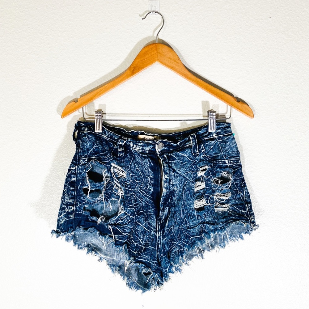 High waisted highly distressed shorts